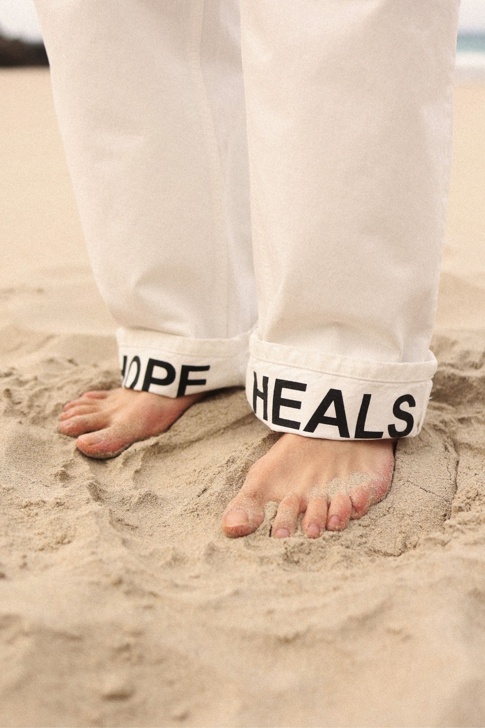 Hope Heals pleated trousers